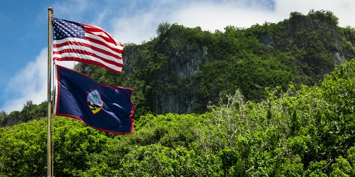 A United States flag and Guam flag